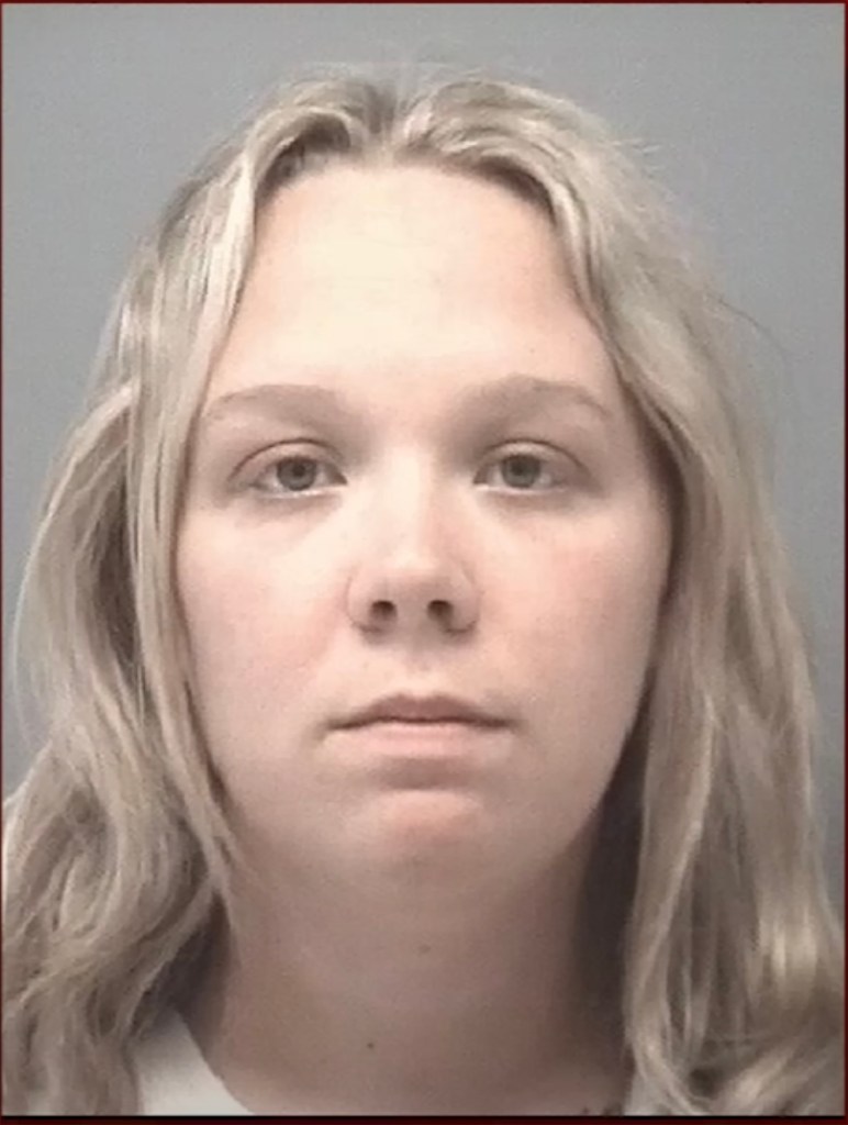 Mugshot of a woman with blonde hair.