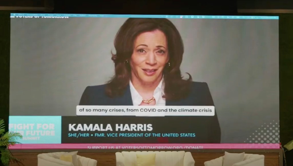 Screen showing Kamala Harris speaking at the Voters for Tomorrow Summit.