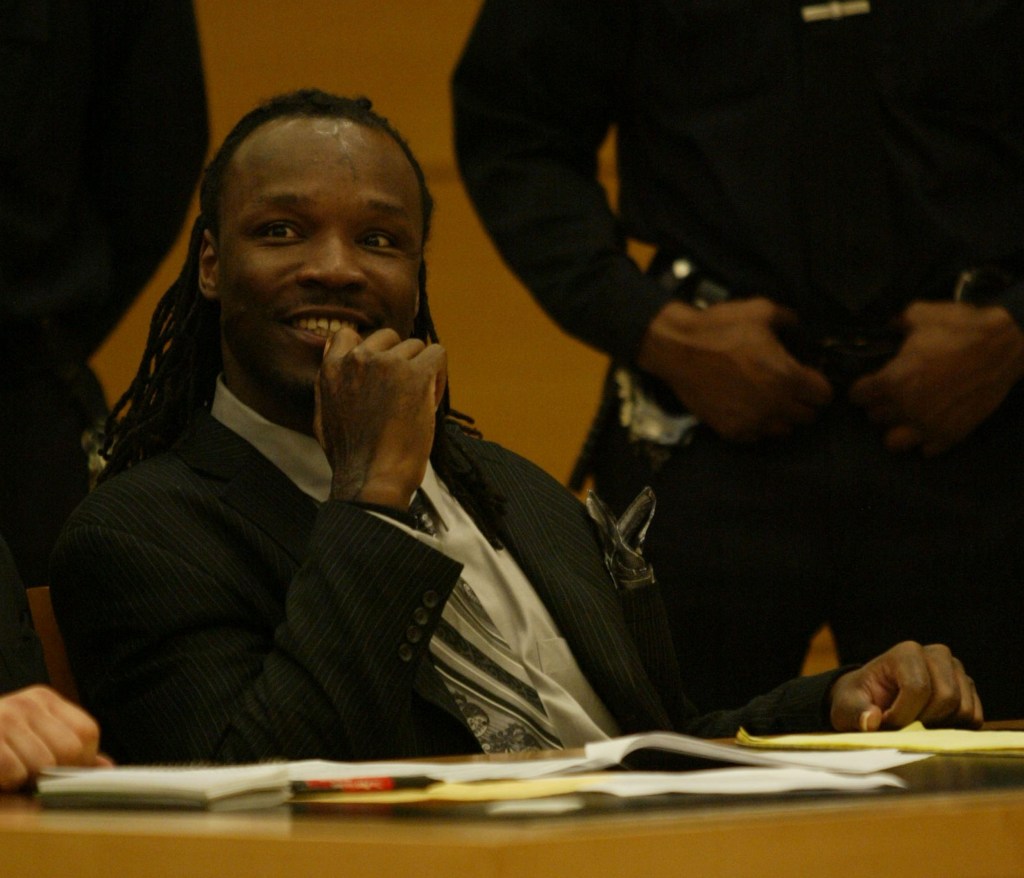 Lee Woods smiling in court after receiving a 40-years-to-life sentence.