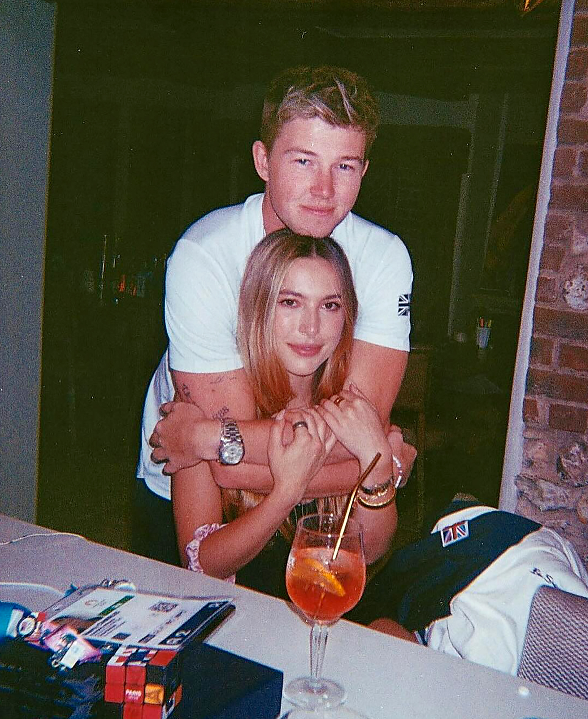 Harry Charles and Eve Jobs pose for a photo. 