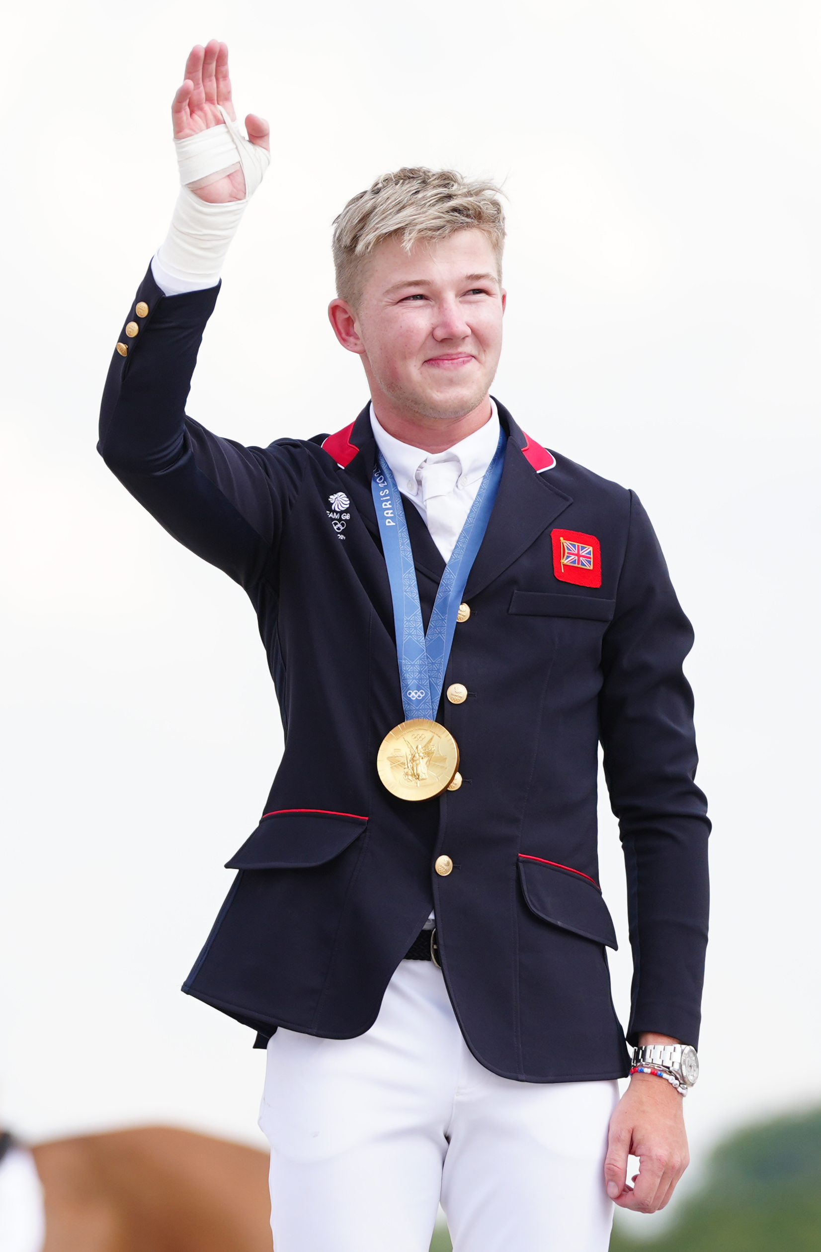 Harry Charles with a gold medal. 