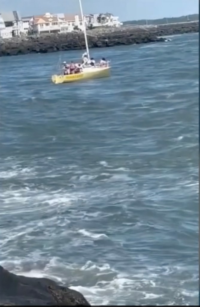 Ten people had to be rescued after a sailboat hit a jetty near Avalon, N.J.