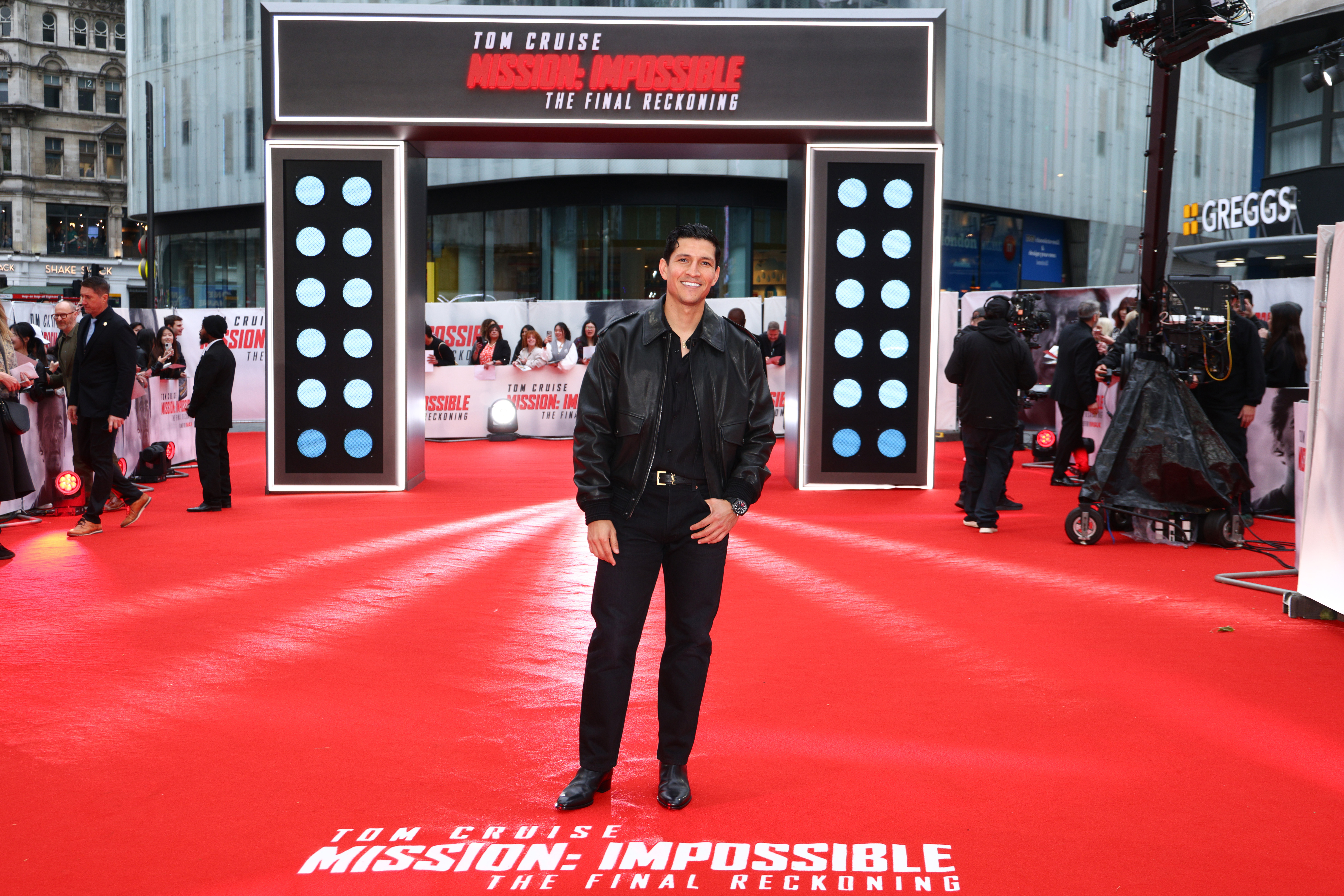 Danny Ramirez on a red carpet. 