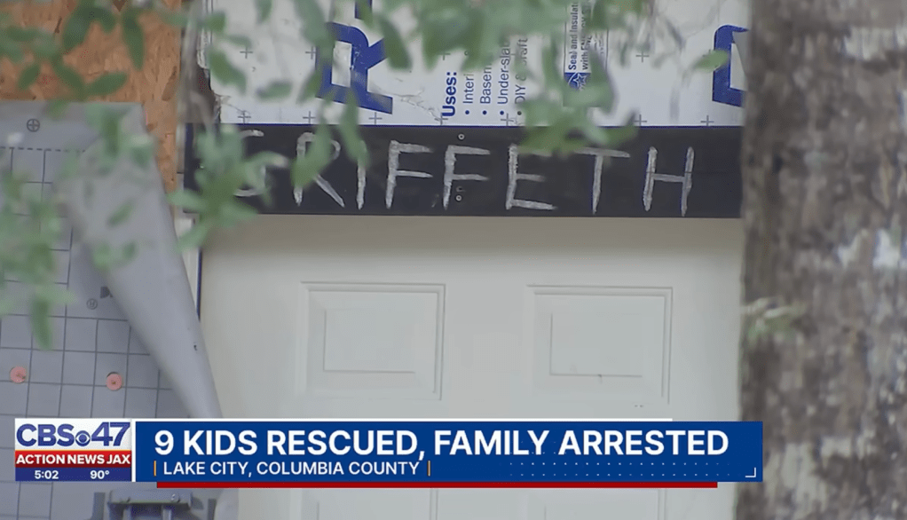 A sign with the Griffeth name hangs over the door outside the Fort White, Florida home.