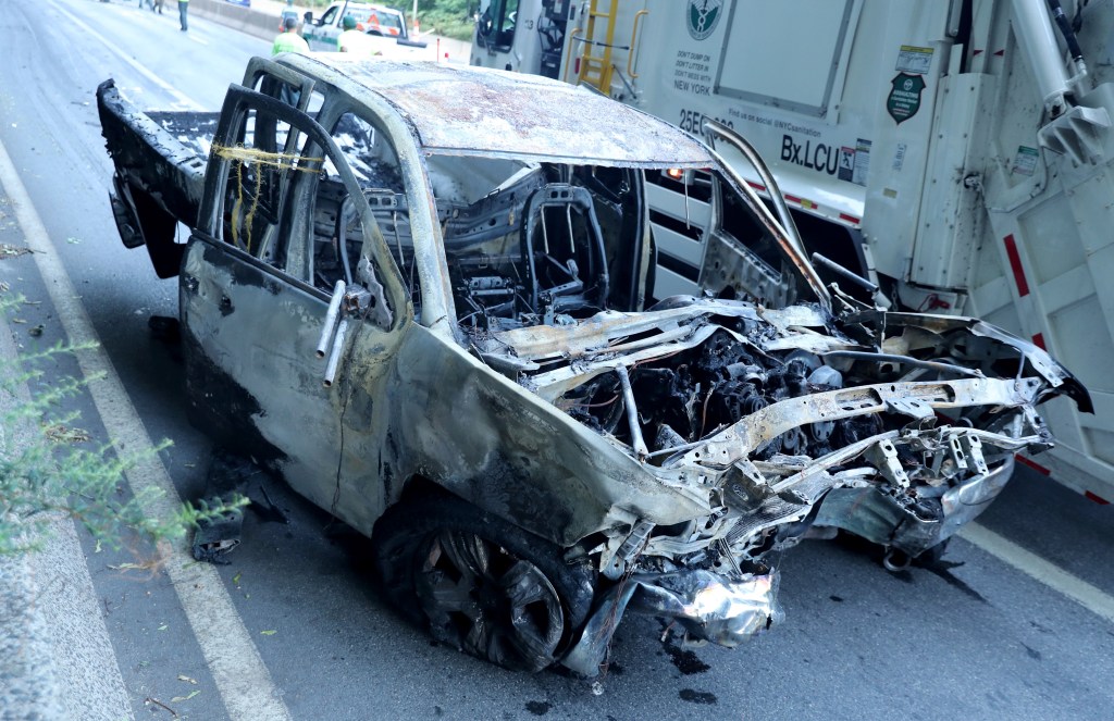 An image of a burned-out car after the fatal accident.