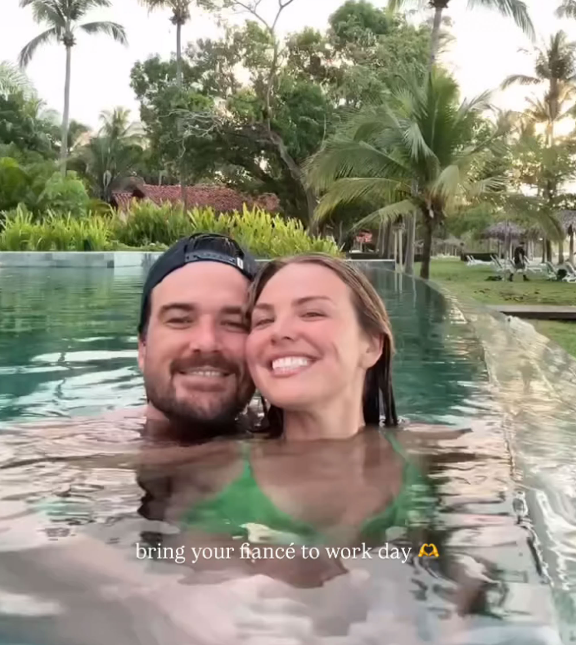 Adam Woolard and Hannah Brown in the water. 