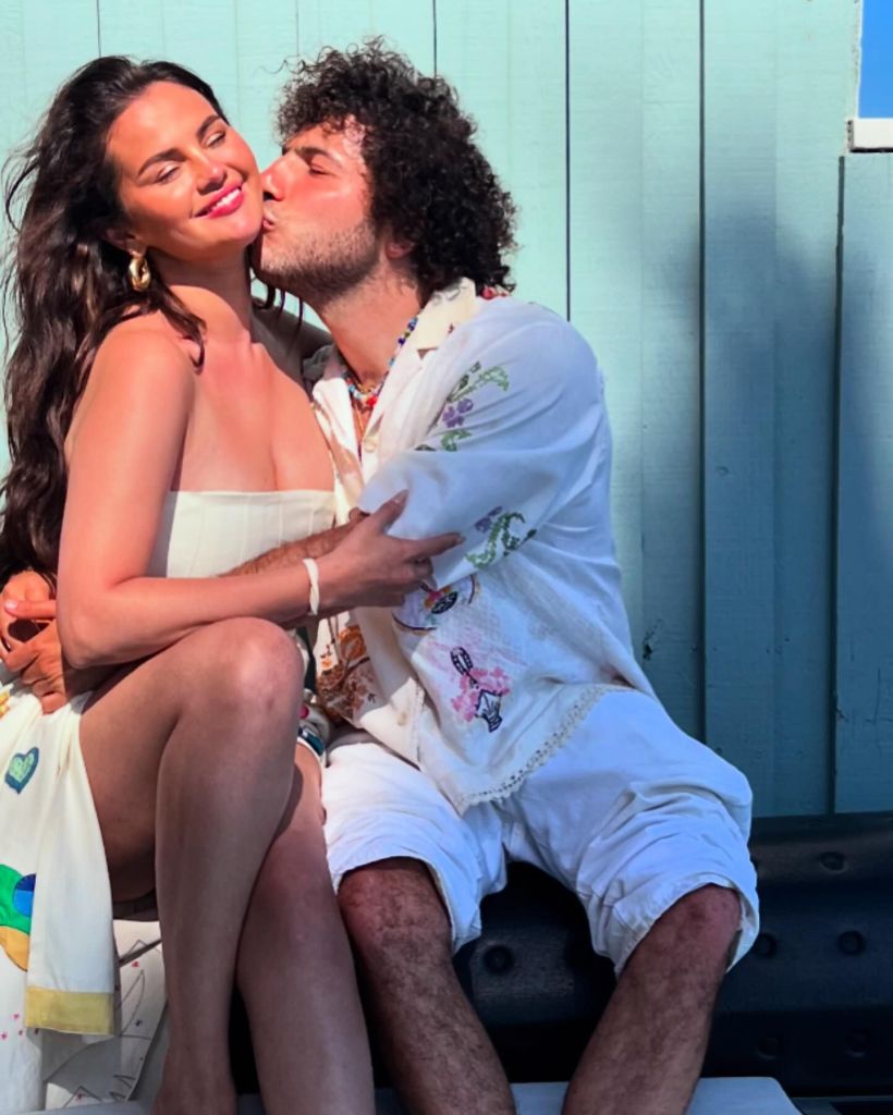 Benny Blanco kissing Selena Gomez.