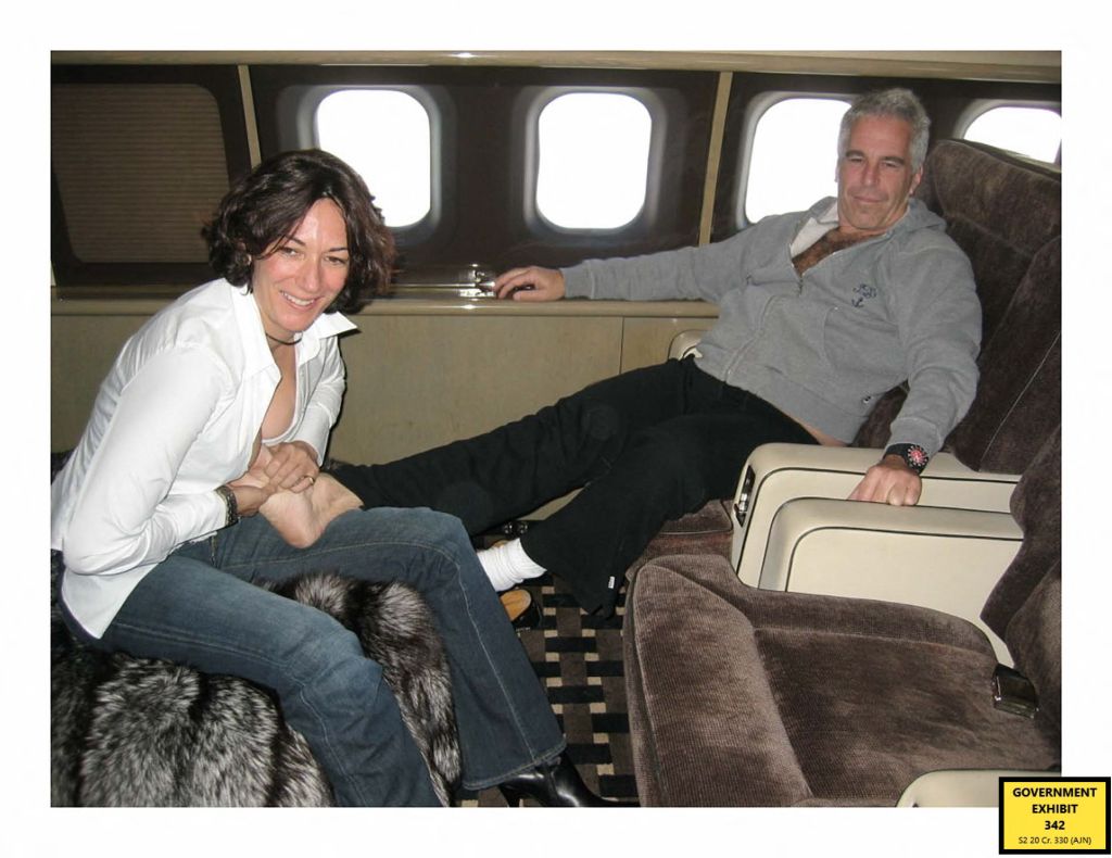 Photo of Ghislaine Maxwell massaging Jeffrey Epstein's feet on a private jet.