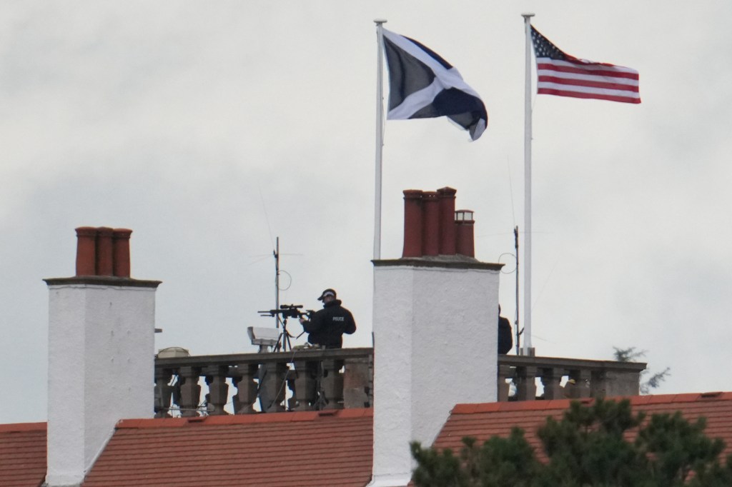 Police snipers positioned on the roof of the Trump Turnberry hotel on July 27, 2025.