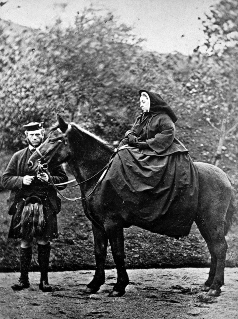 Queen Victoria horseback riding with John Brown.