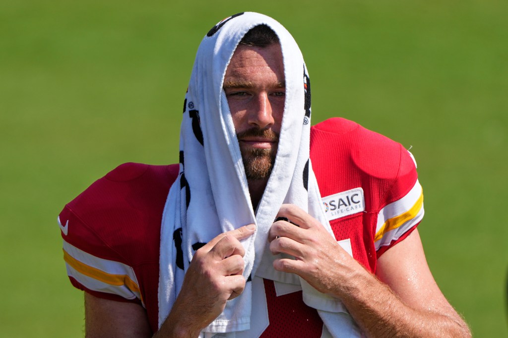 Kansas City Chiefs tight end Travis Kelce cools off during Back Together Weekend at the team's NFL football training camp
