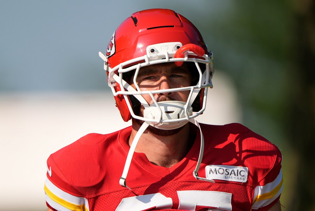 Kansas City Chiefs tight end Travis Kelce walks to practice during Back Together Weekend at the team's NFL football training camp.