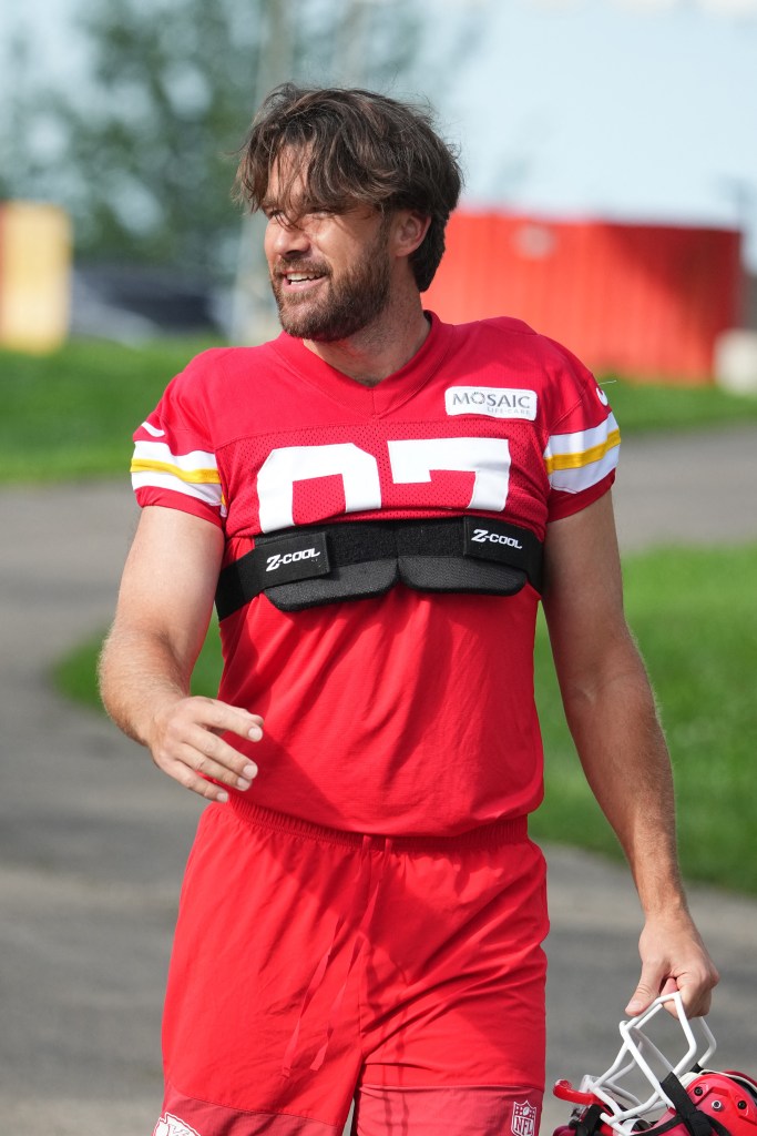 Travis Kelce (87) walks down the hill to the practice fields during training camp at Missouri Western State University.