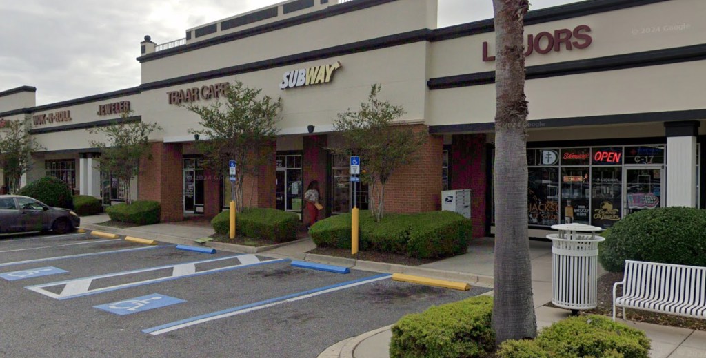 Street view of a shopping center in Jacksonville, Florida, including a Subway restaurant.