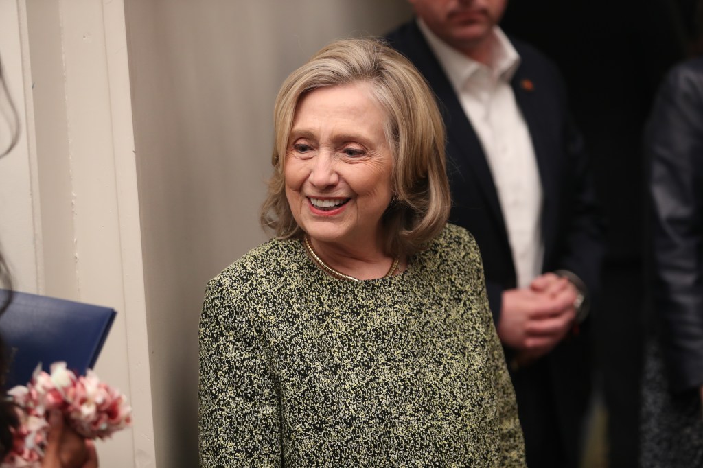 Hillary Clinton smiling.