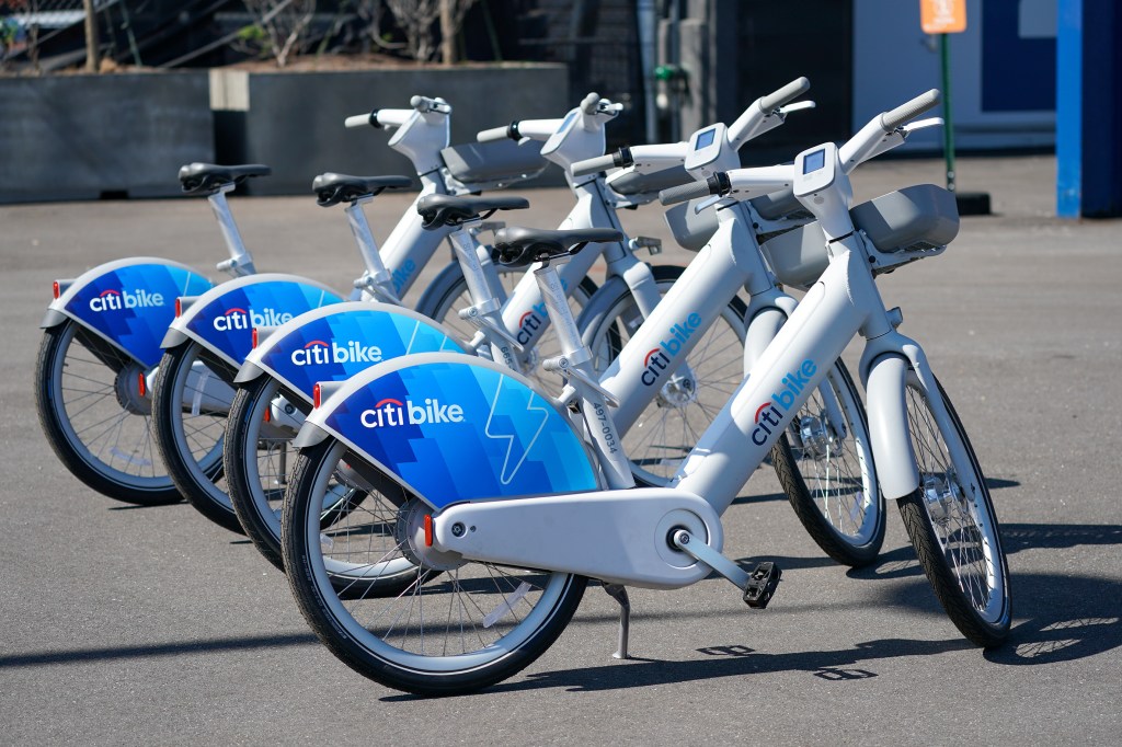 Several Citi Bikes lined up.