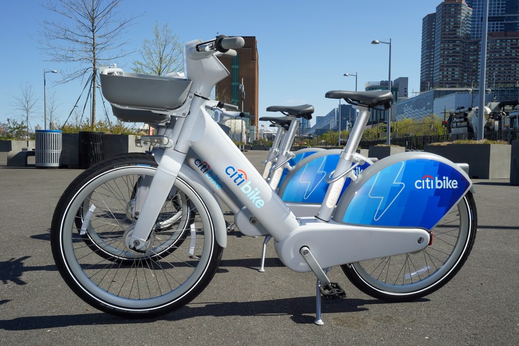 Citi Bike e-bikes parked outdoors.