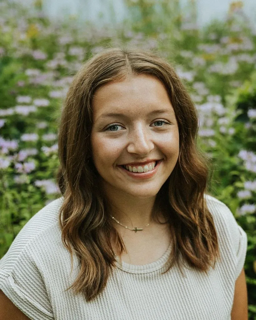 Portrait of a smiling young woman.