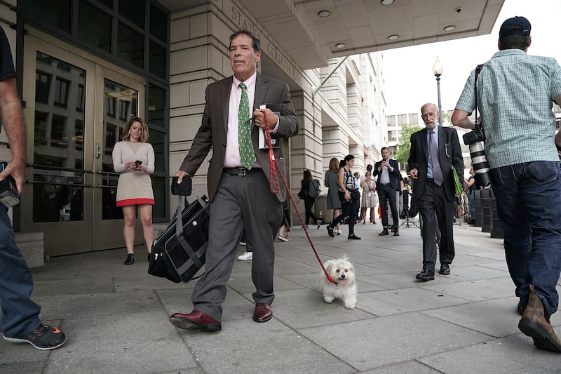 Randy Credico and his dog Bianca leave court in September 2018 after Credico testified before special counsel Robert Mueller's grand jury.