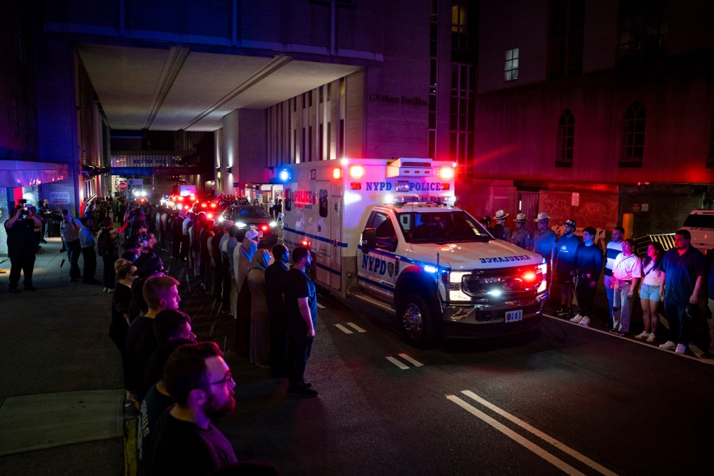 The ambulance carrying the body of slain NYPD officer Didarul Islam exits New York-Presbyterian/Weill Cornell Medical Hospital