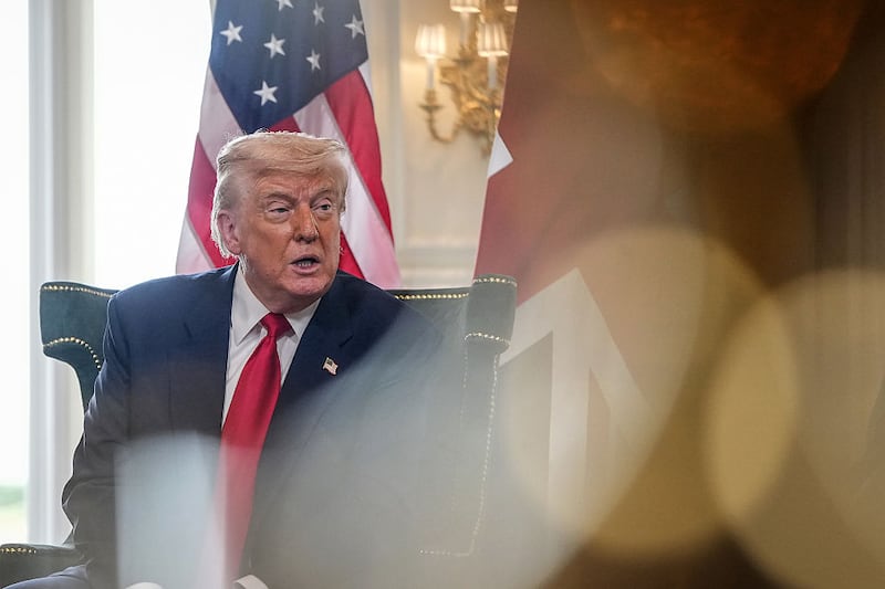 President Donald Trump reacts as he meets with British Prime Minister Keir Starmer (not pictured) at Trump Turnberry golf club on July 28, 2025 in Turnberry, Scotland. U.S. President Donald Trump is visiting his Trump Turnberry golf course, as well as Trump International Golf Links in Aberdeenshire, during a brief visit to Scotland from July 25 to 29. (Photo by Christopher Furlong/Getty Images)