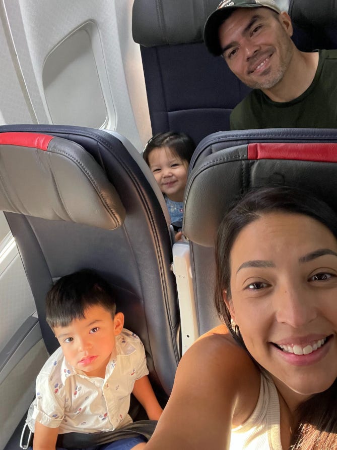 Bianca Ramos, her husband, and two kids on the flight to Mexico.