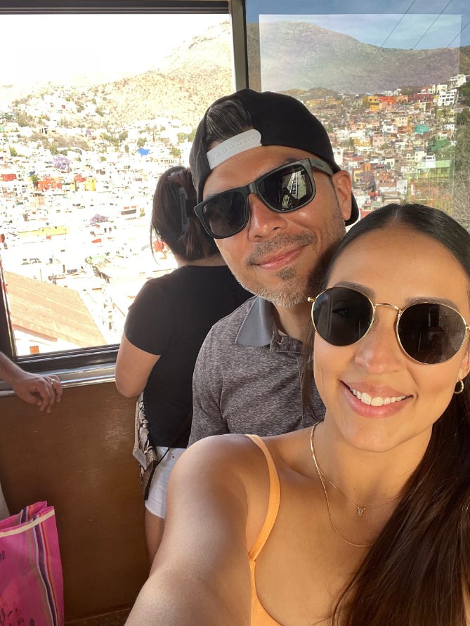 Ramos and her husband smiling for a selfie.