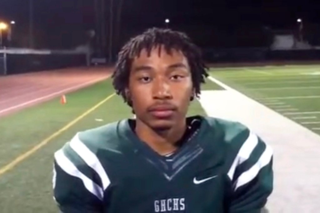 Photo of Shane Devon Tamura in a football uniform.