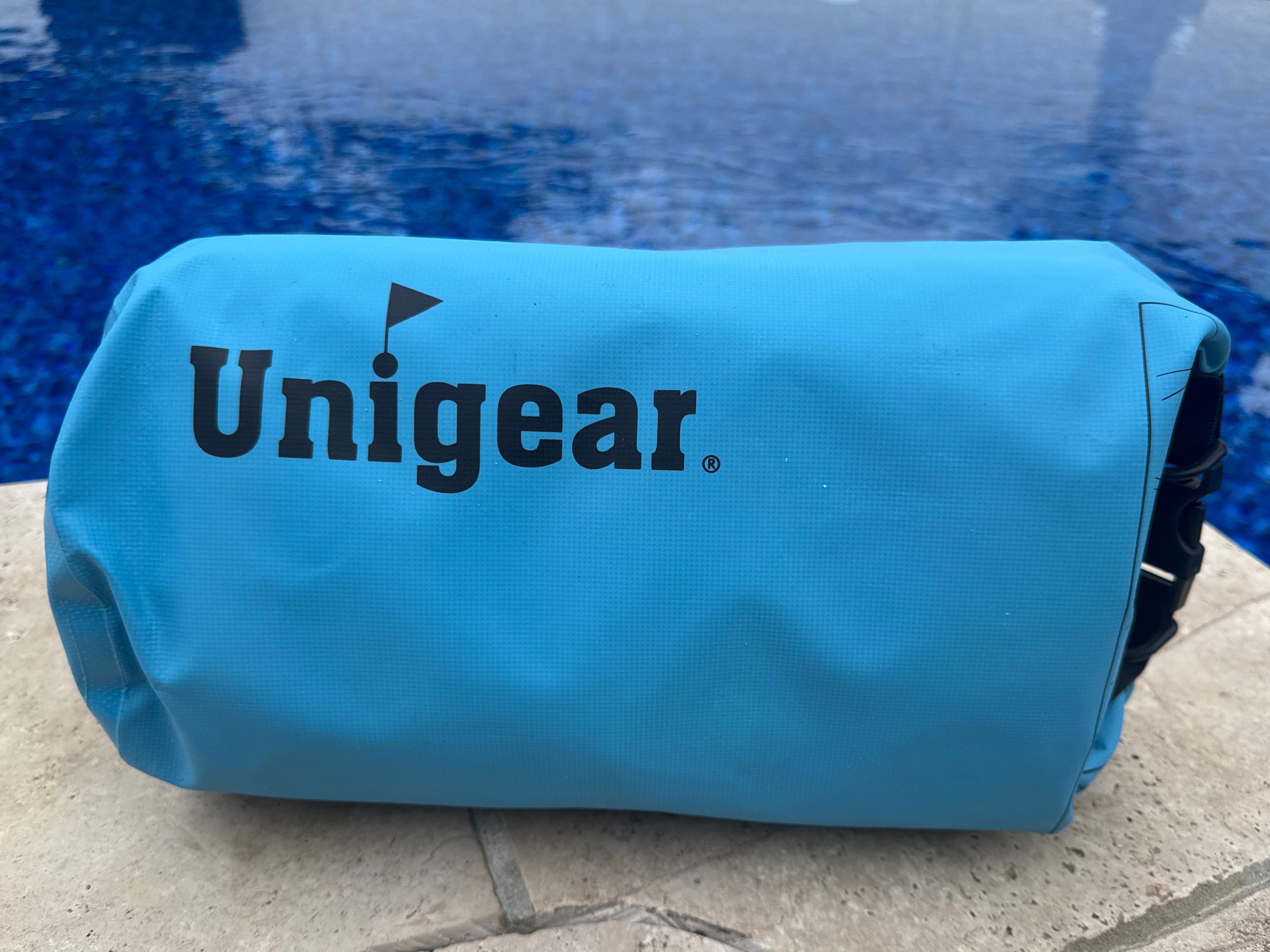 A blue Unigear sand-bag anchor.
