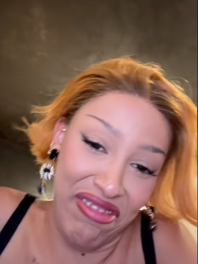 Doja Cat mocking Sydney Sweeney's American Eagle Outfitters jeans ad on TikTok.