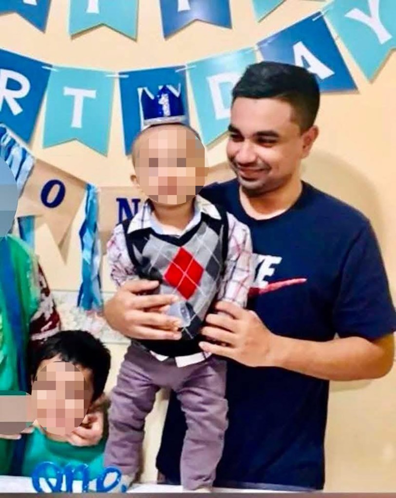 Photo of Didarul Islam with his children.
