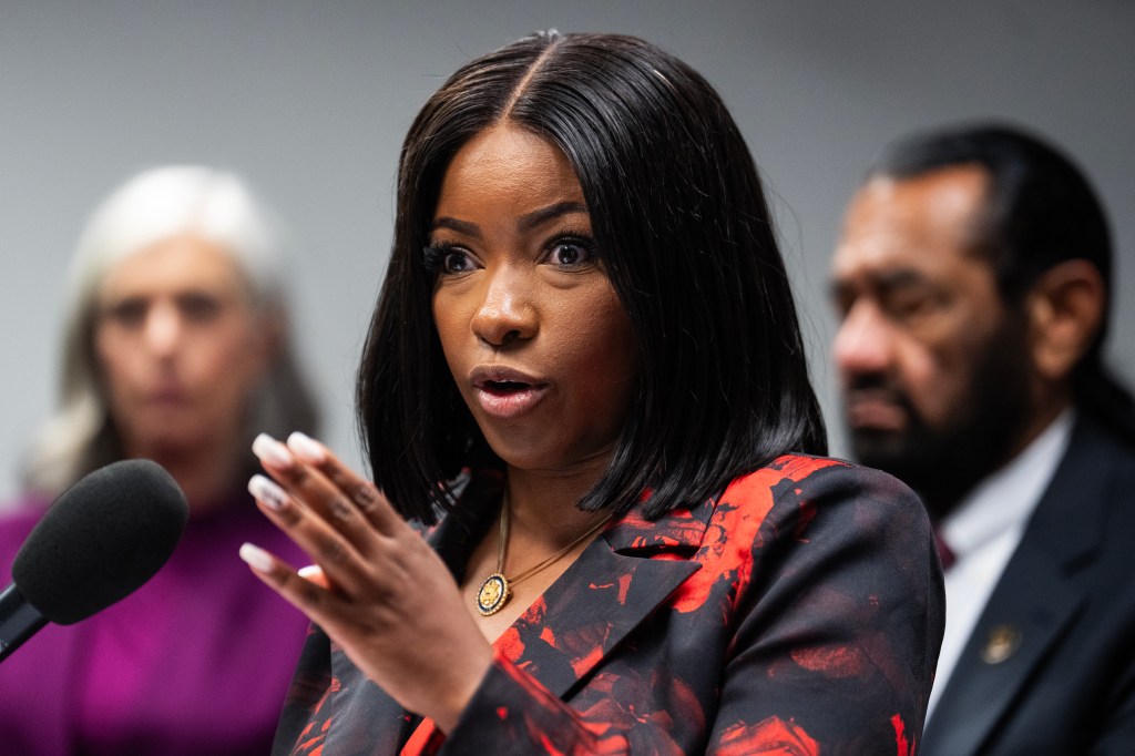Rep. Jasmine Crockett speaking at a press conference.