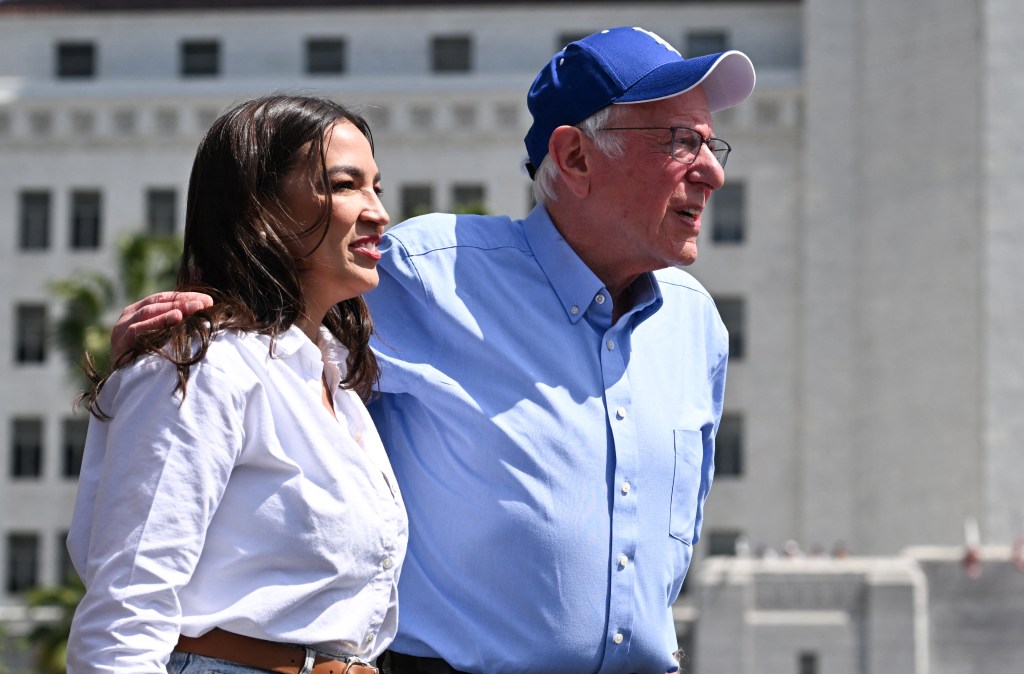 Bernie Sanders and Alexandria Ocasio-Cortez at a rally.