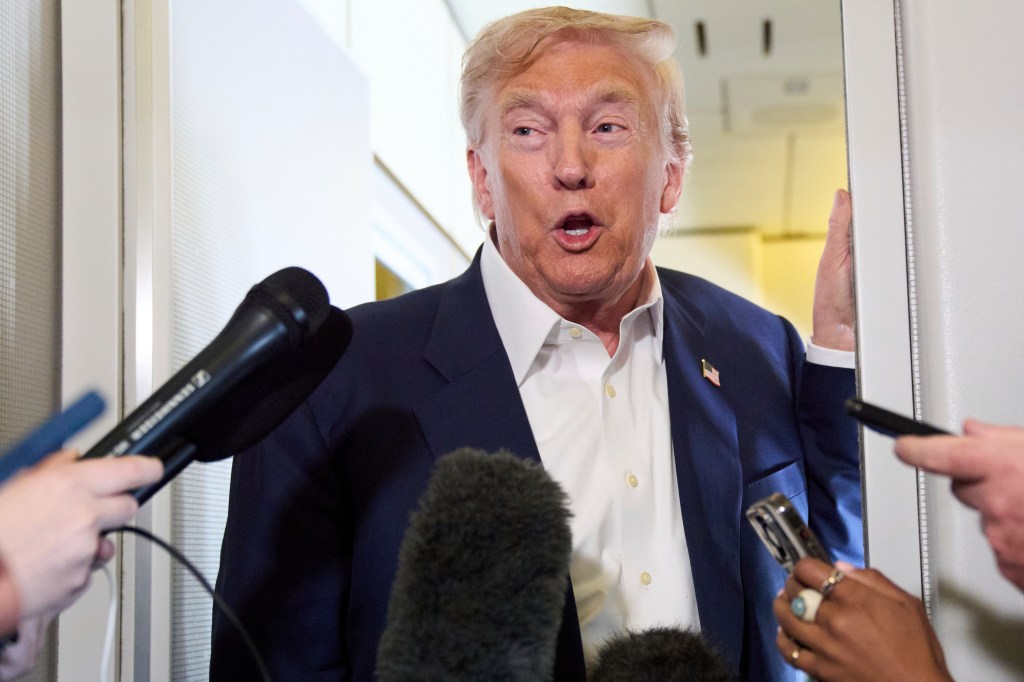 Donald Trump speaking to reporters.
