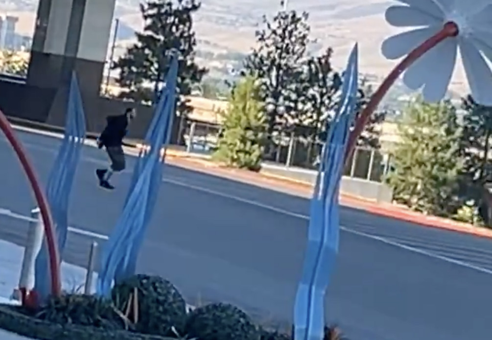 Person running away from a scene.