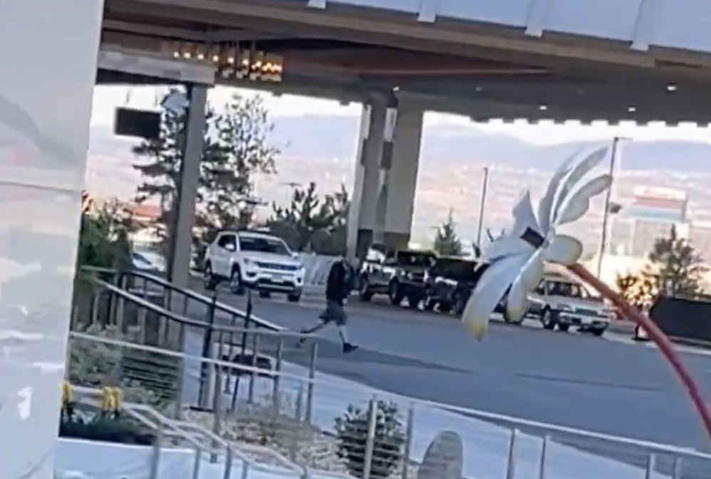 Person running from a shooting scene.