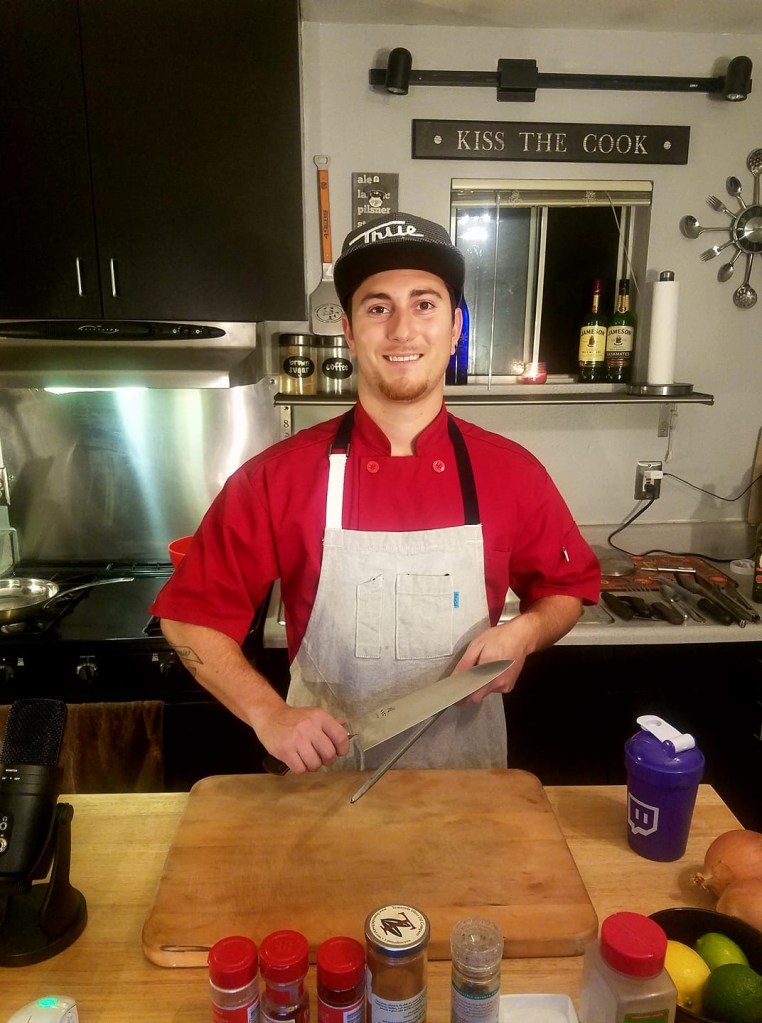 Andrew Canepa, chef at Side Street Café, sharpening a knife.