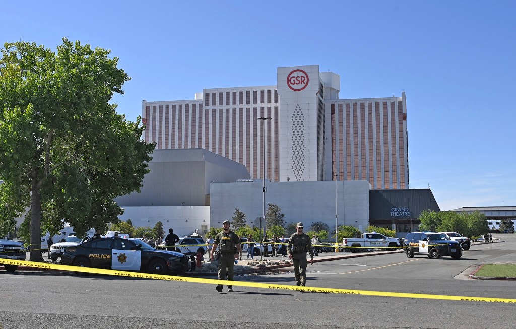 Police officers at a crime scene outside the Grand Sierra Resort in Reno, Nevada.