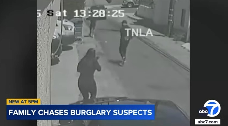 began to chase after the pair, recording them on her phone, as they bolted towards a dark green BMW.