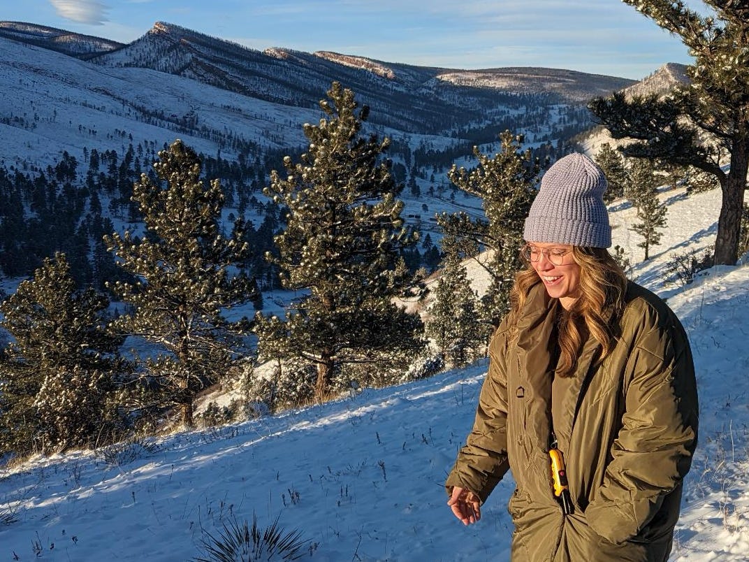 woman in colorado wilderness in winter