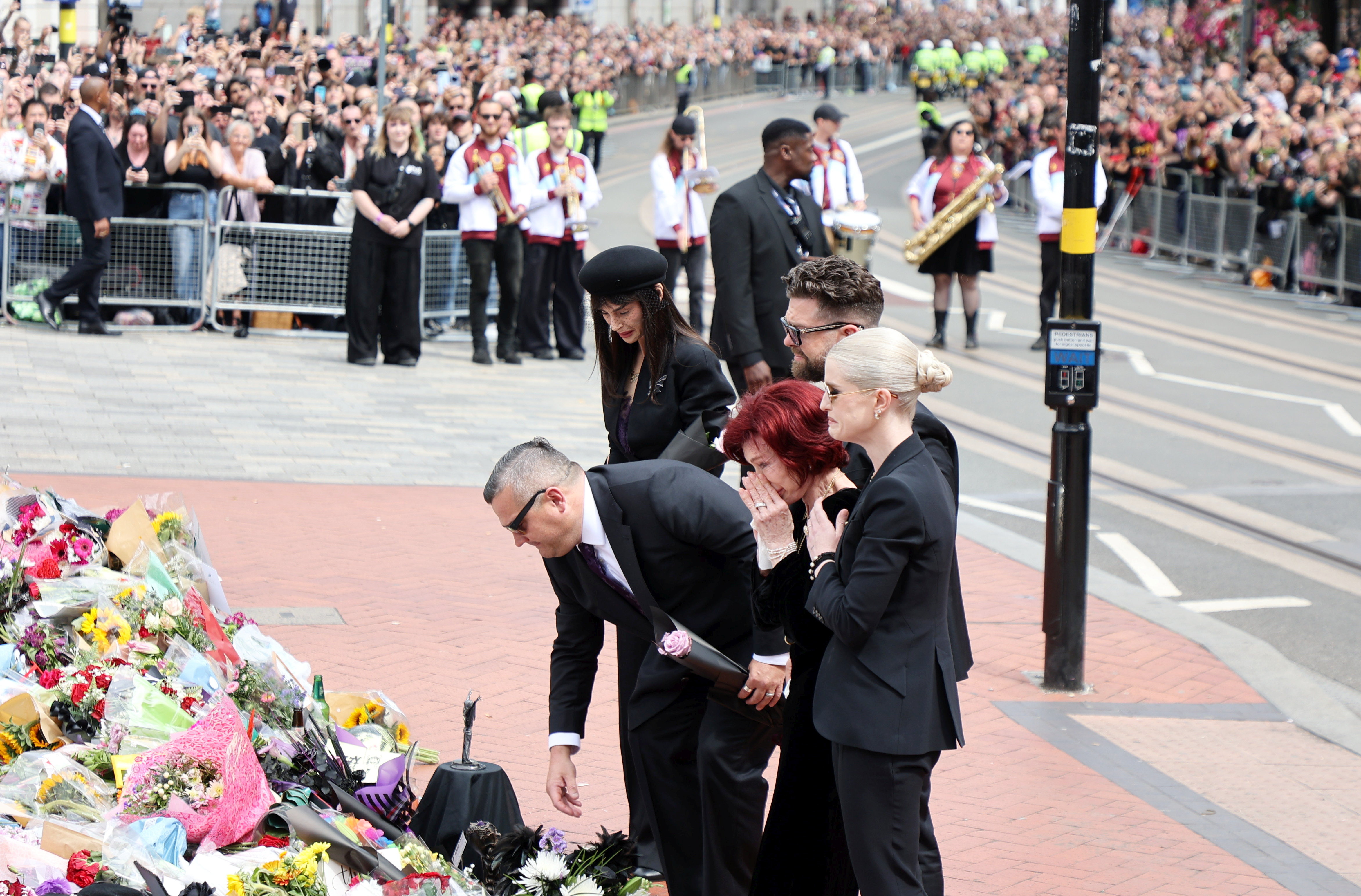 Jack Osbourne, Sharon Osbourne and Kelly Osbourne view tributes to the late Ozzy Osbourne from fans