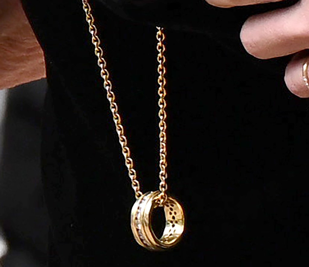 Sharon wearing Ozzy's ring at his funeral