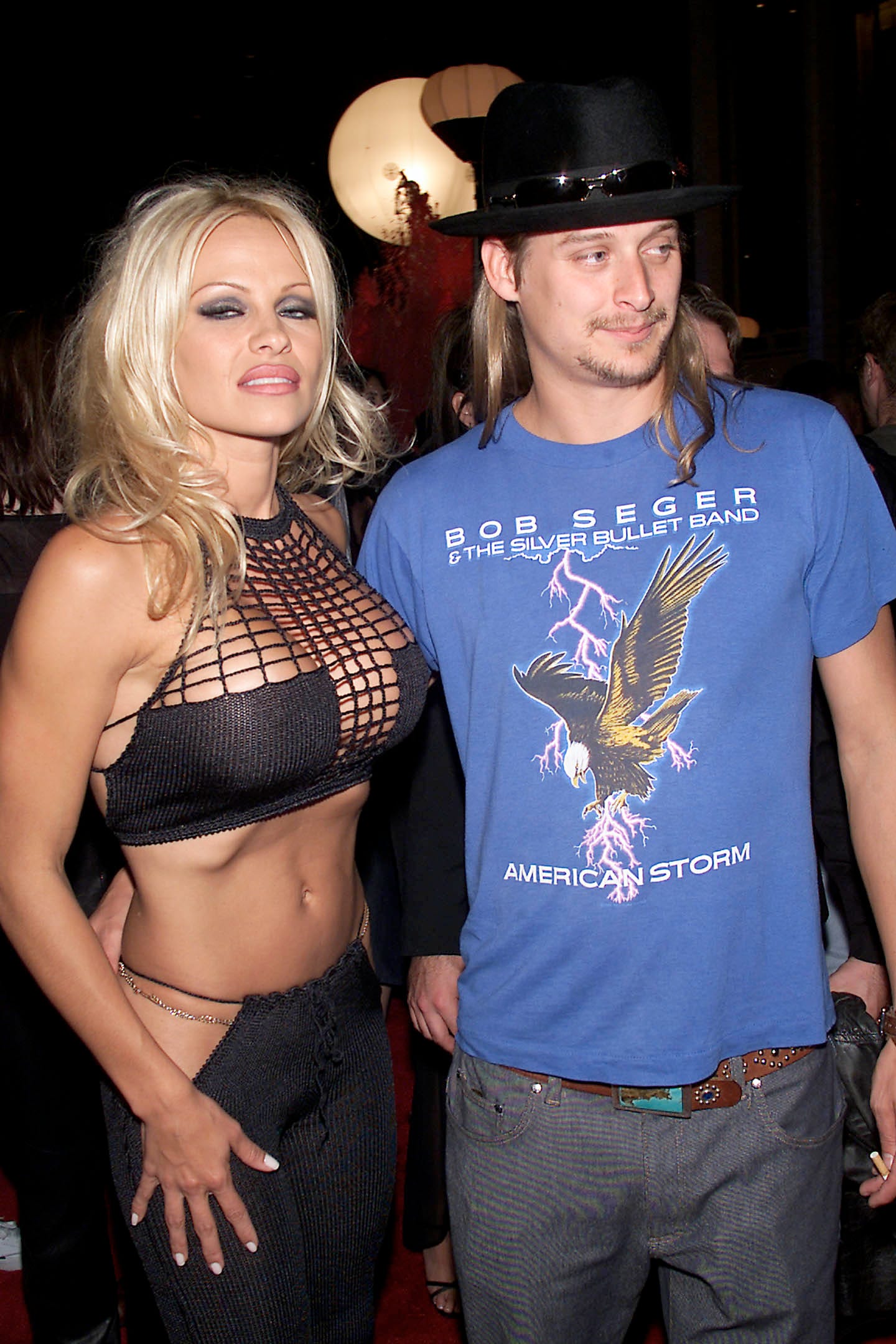 Pamela Anderson standing next to Kid Rock