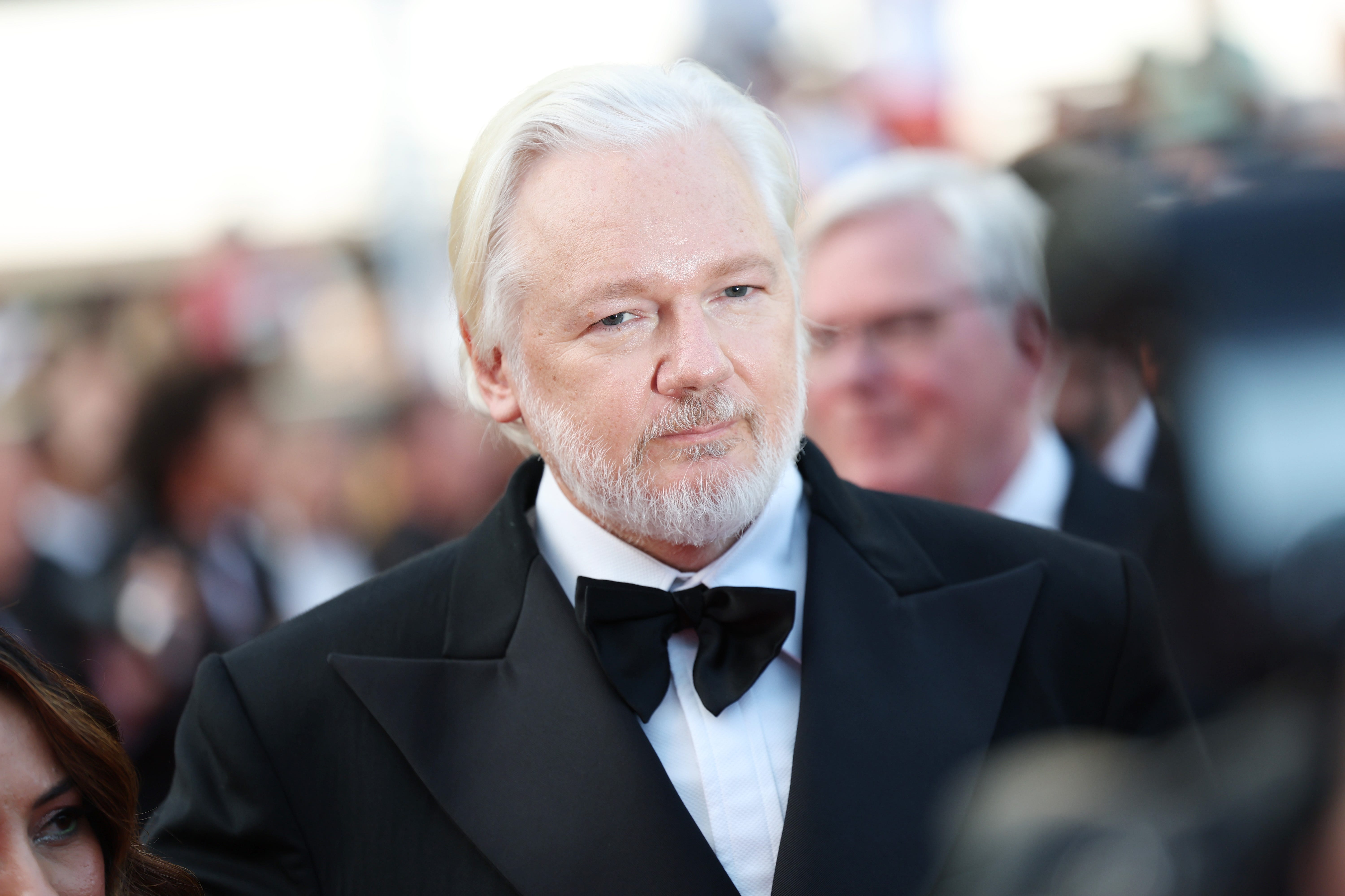 Julian Assange in a tuxedo
