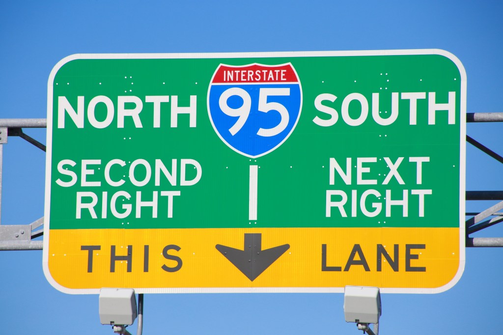 I-95 North/South highway sign: directions for next right and second right exits.