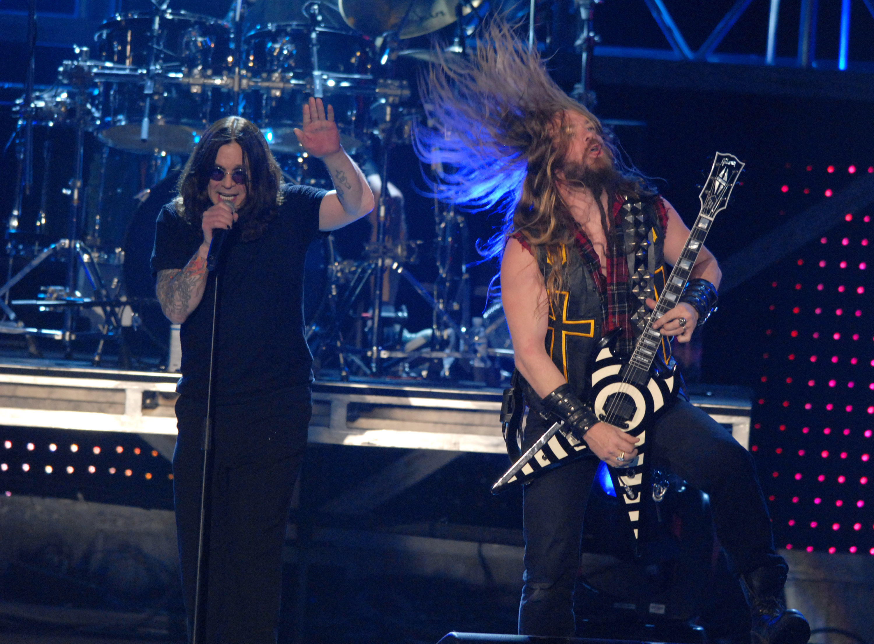 Zakk Wylde rocks out onstage with Ozzy Osbourne. 
