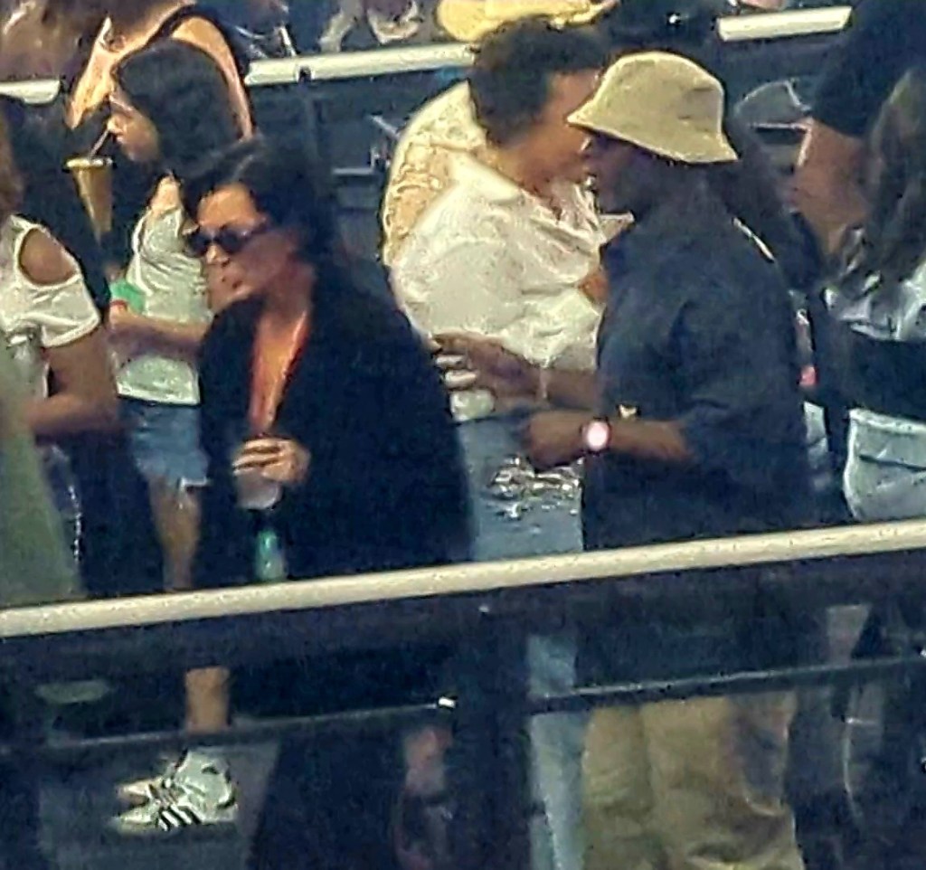 Kris Jenner walking away from Corey Gamble at Beyonce's 