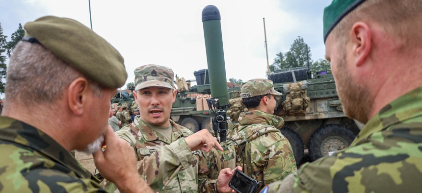 Soldiers demonstrate the use of a Terrestrial Layer System Manpack during the static display portion of Project Flytrap 4.0, at Bemowo Piskie Training Area, July 29, 2025.