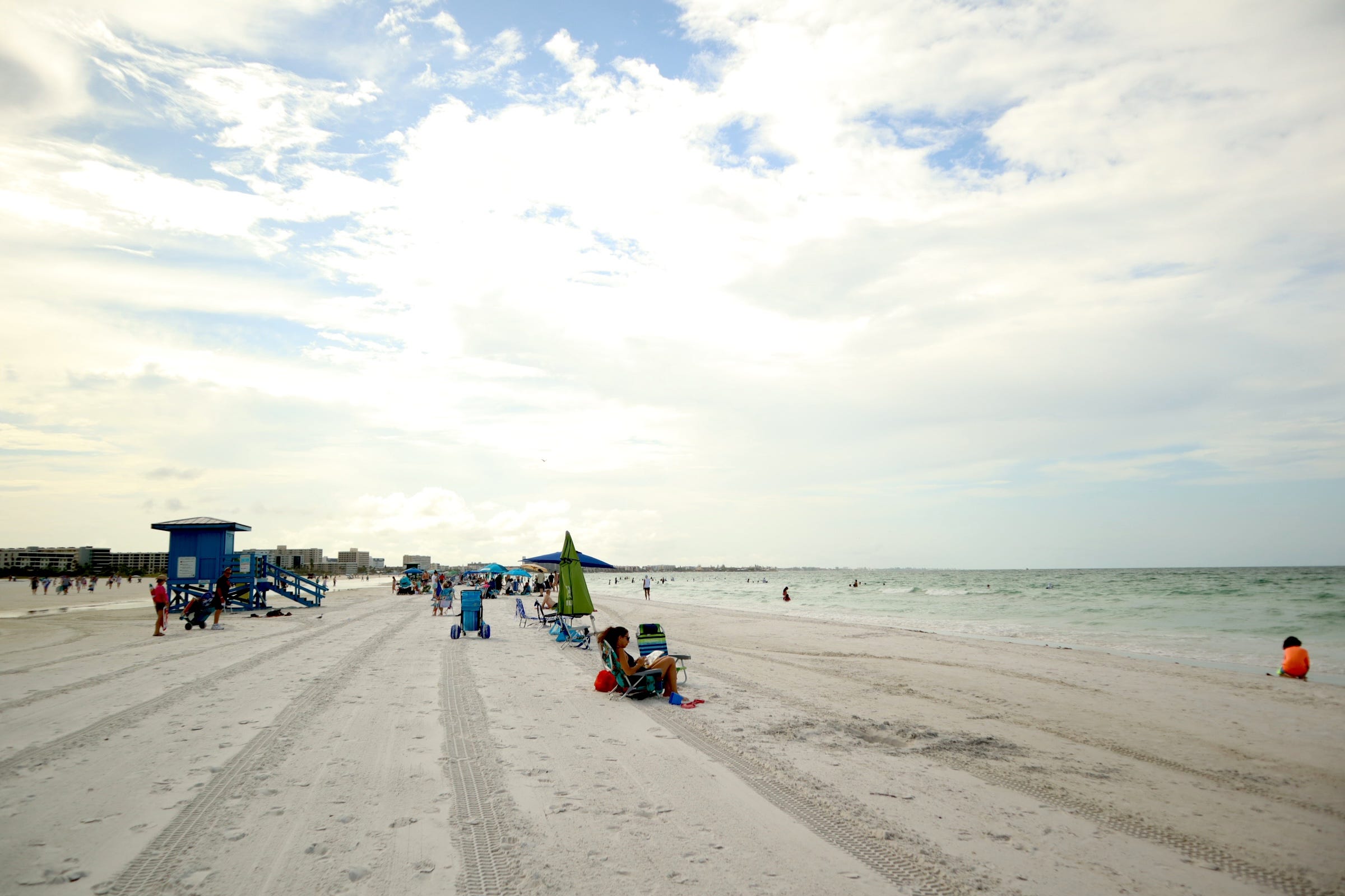 people on the beach at siesta key