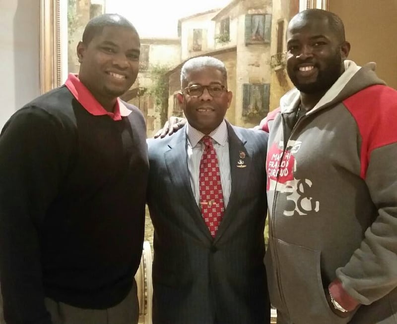 Byron Donalds, right, poses with former Republican Rep. Allen West, center, and Larry Wilcoxson, right, in 2014.